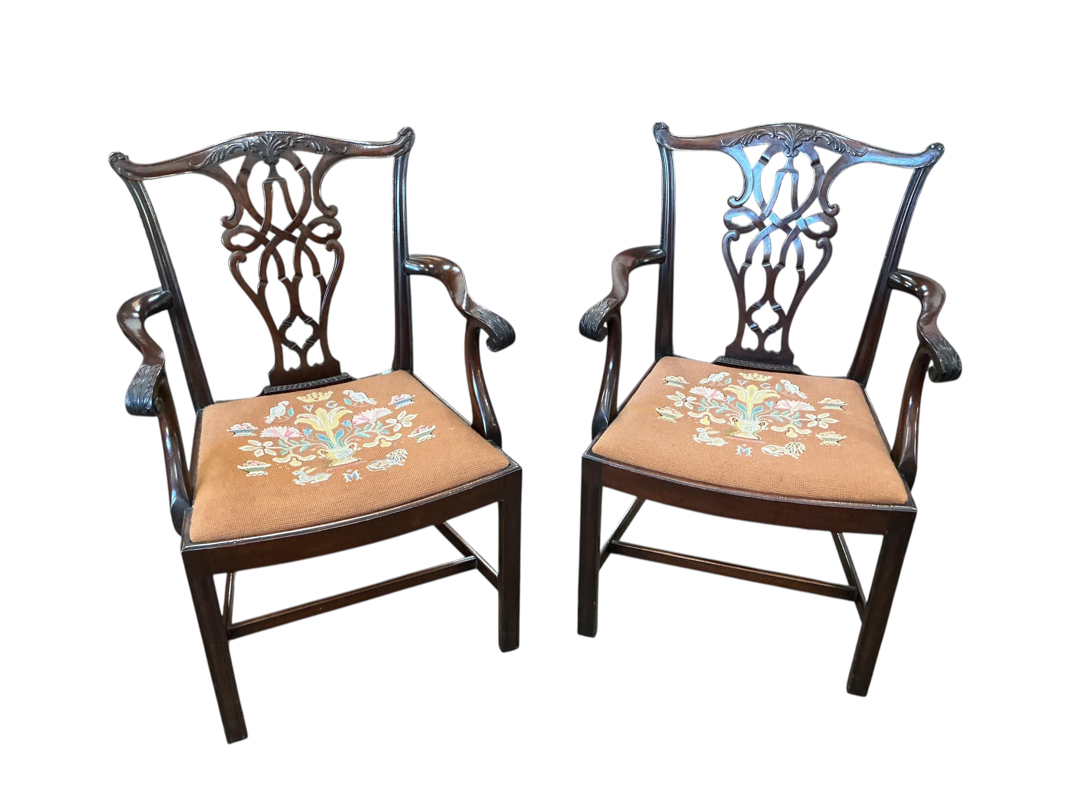 A Victorian style mahogany extending dining table, width 226cm extended, two spare leaves together with a set of eight Chippendale Revival mahogany dining chairs, two with arms